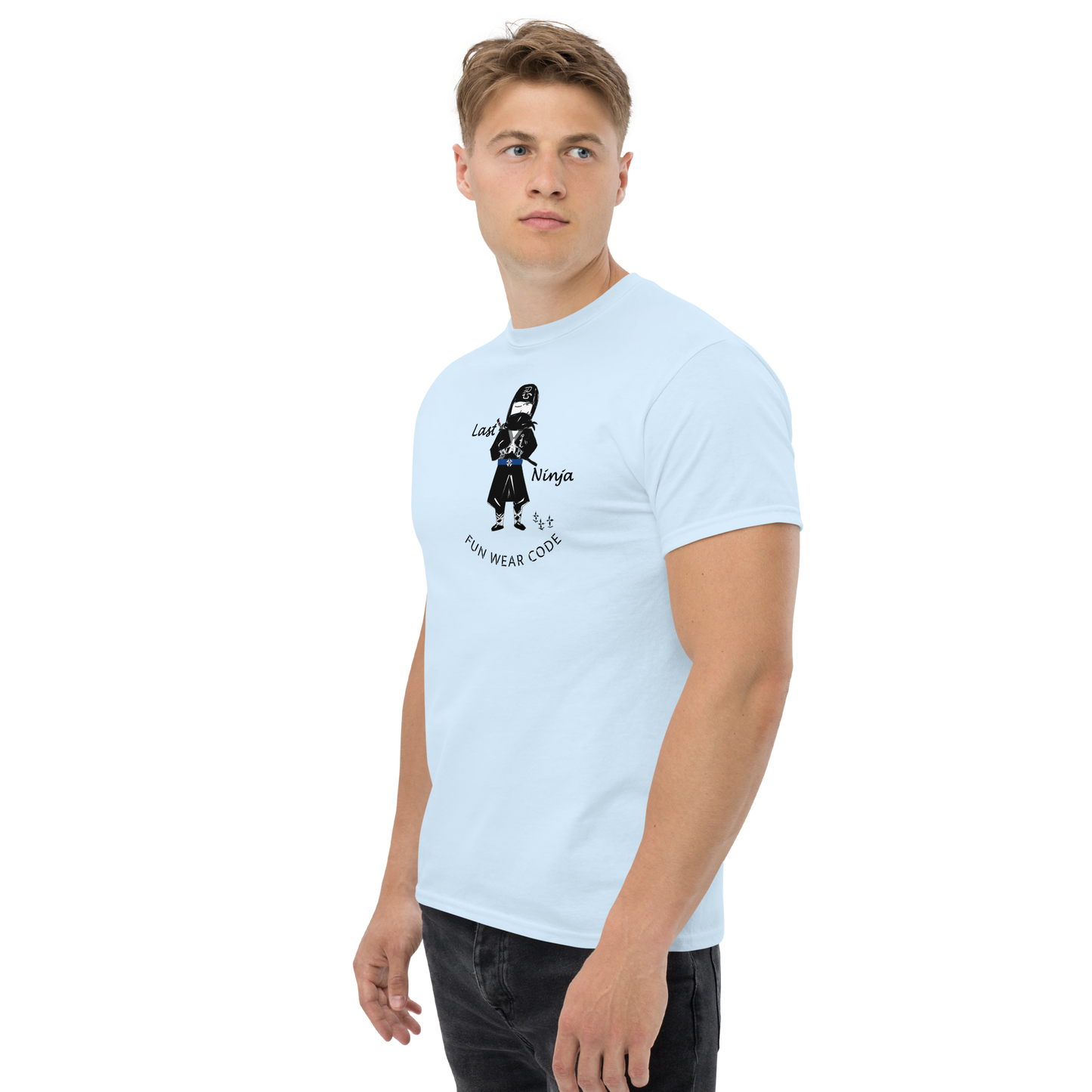 Man wearing a light blue t-shirt with a playful "Last Ninja" graphic design and text "FUN WEAR CODE" on a white background