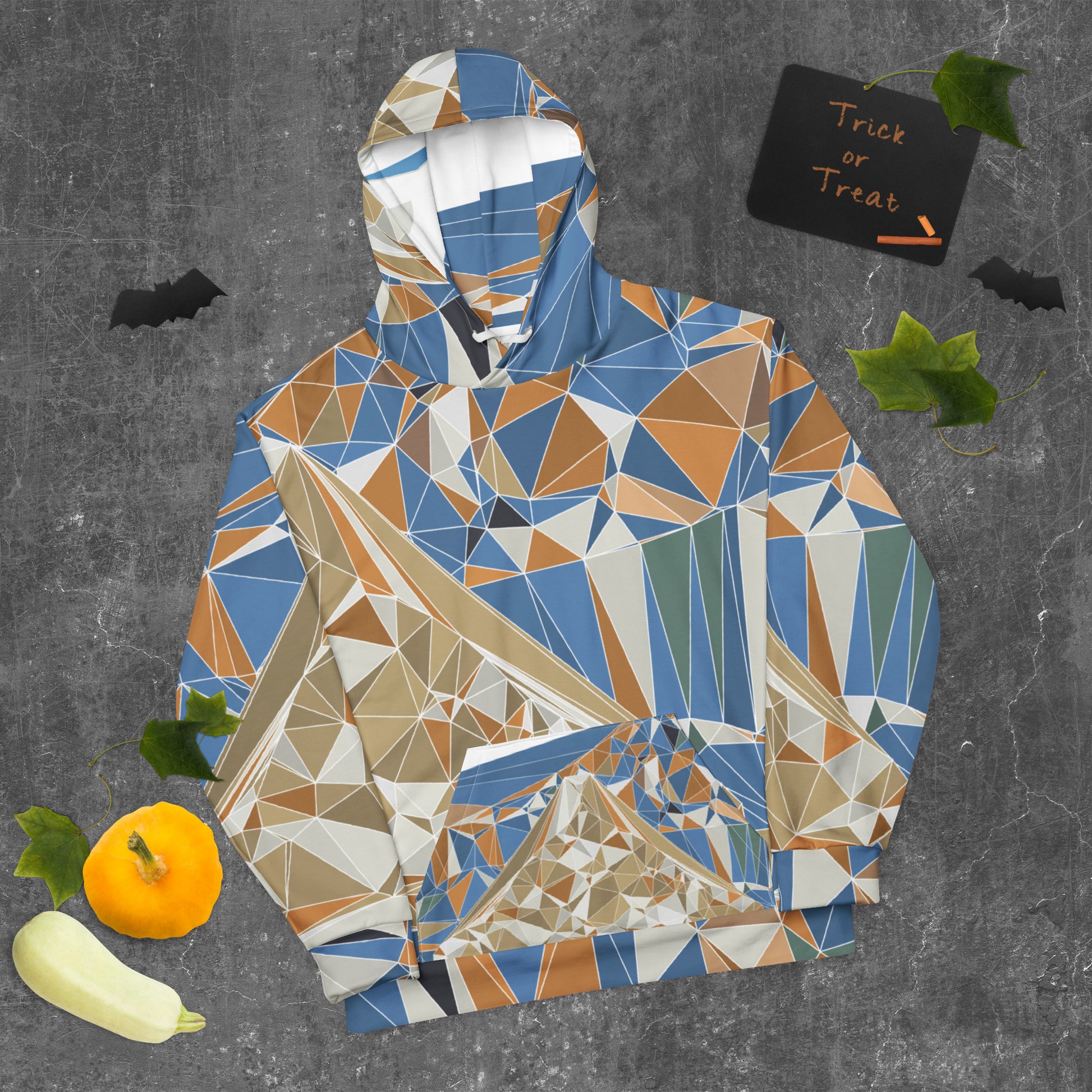 Geometric Mount Fuji patterned hoodie on a textured gray background with Halloween elements.