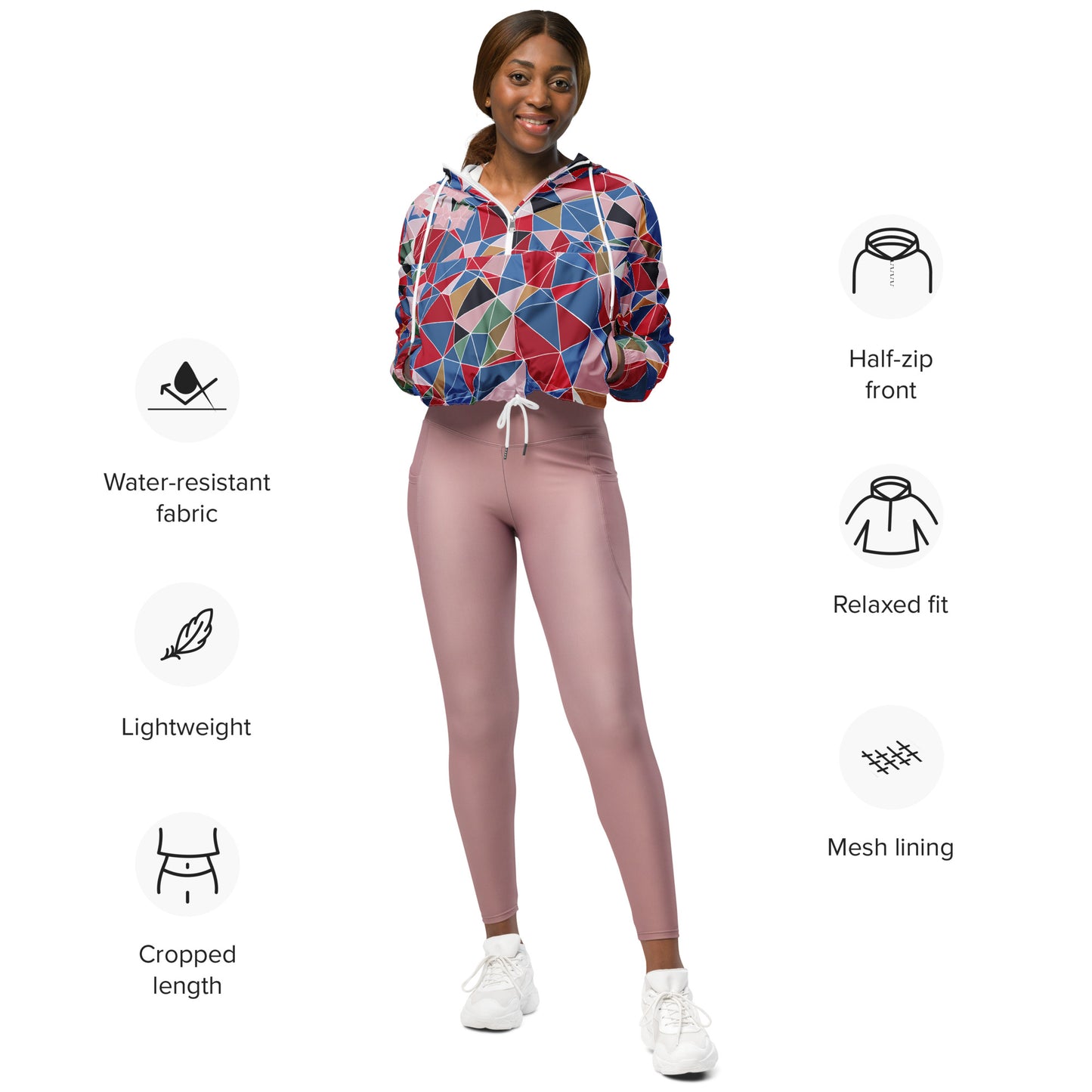 Woman wearing a colorful geometric-patterned hoodie and pink leggings with feature icons on a white background.