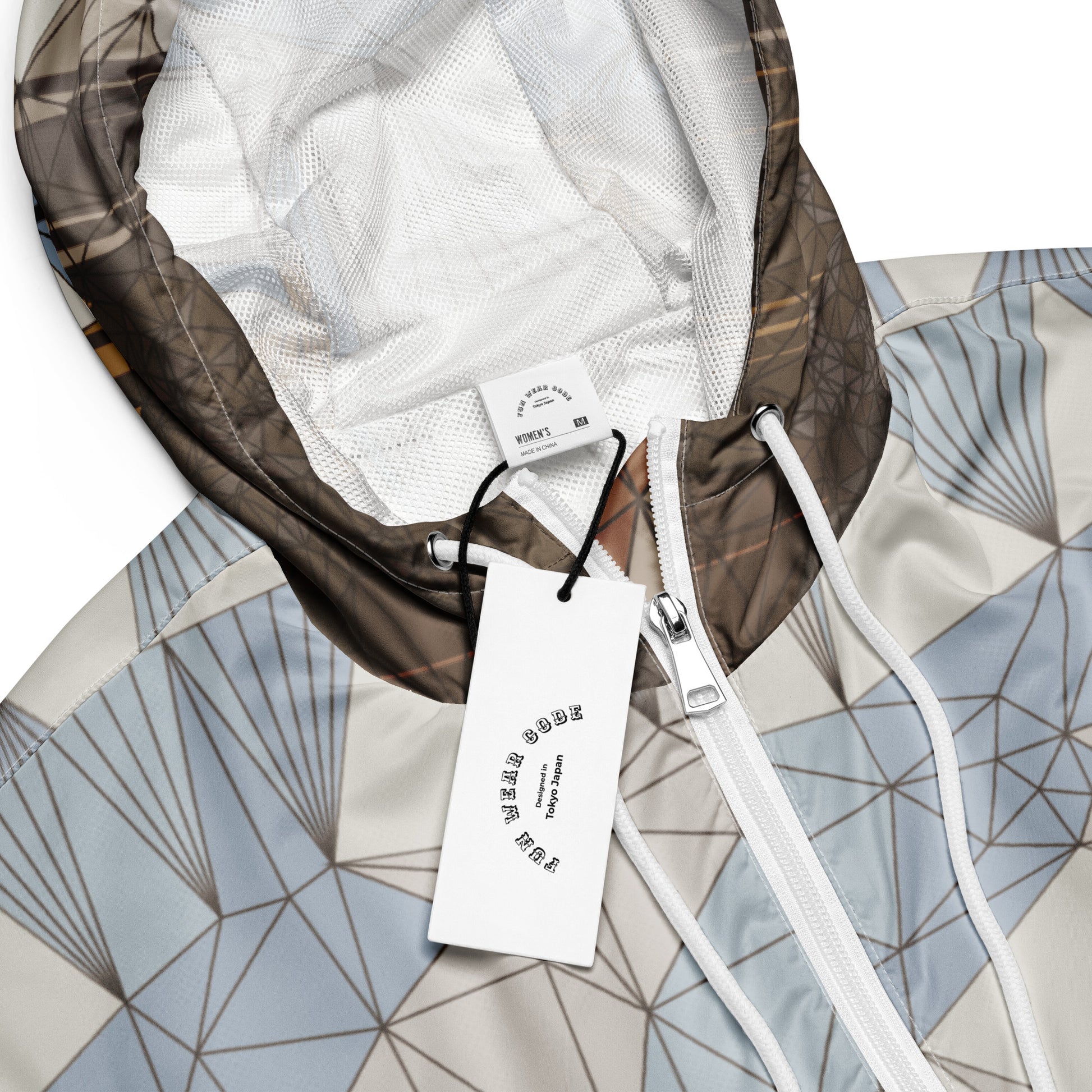 A geometric patterned windbreaker with a Fun Wear Code tag in a  white background