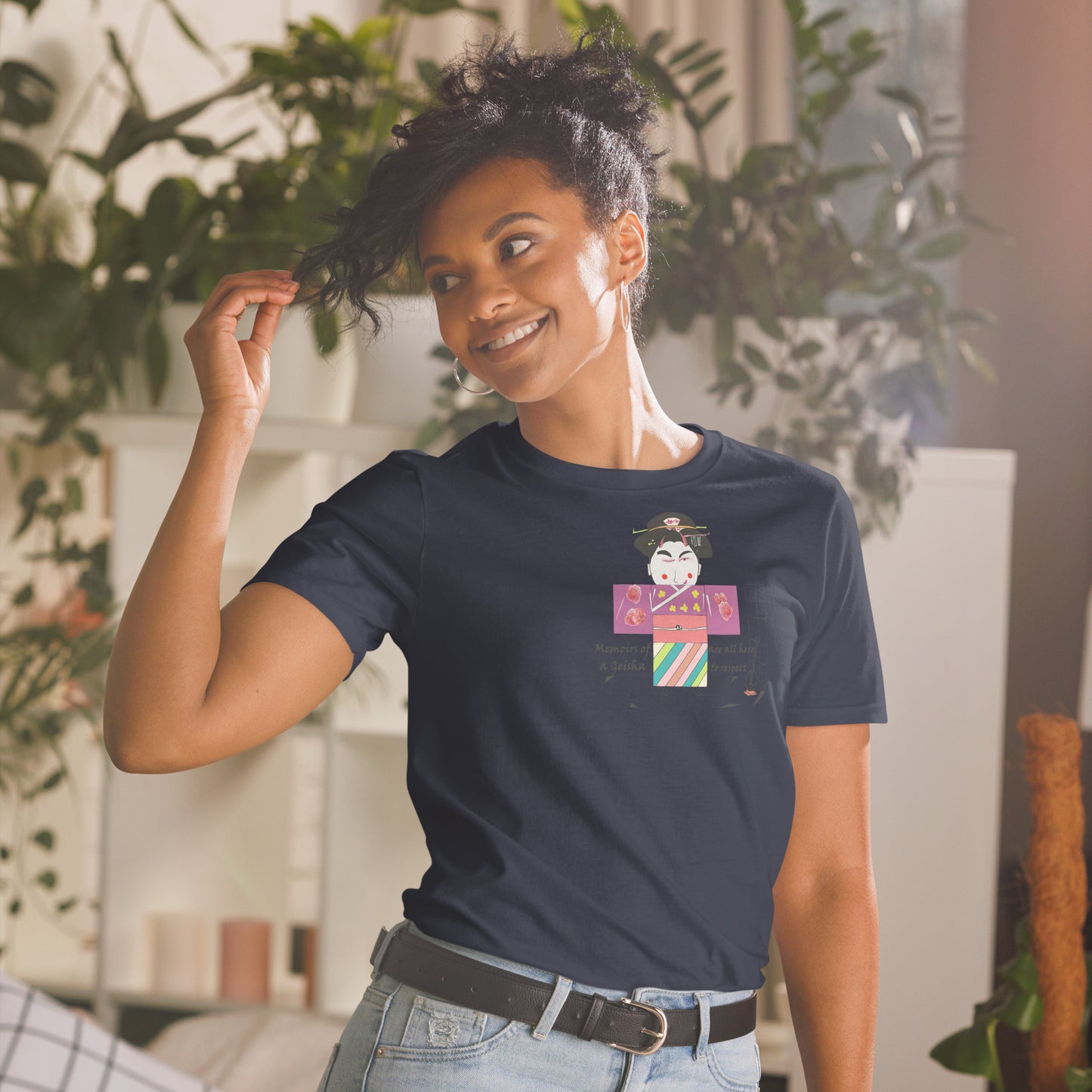 Front view of a lady model wearing a navy t-shirt with a Japanese Geisha graphic design on a home background with plants