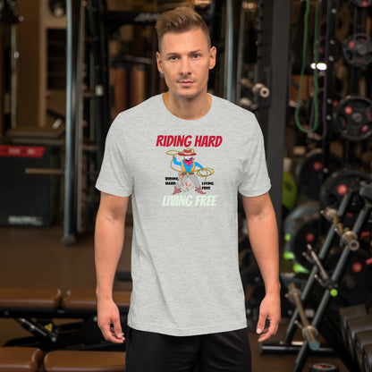 Man wearing a t-shirt with a cowboy graphic design in a gym setting